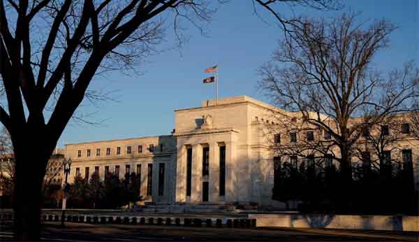 US Fed Reserve hikes interest rates by a quarter percentage point to curb inflation